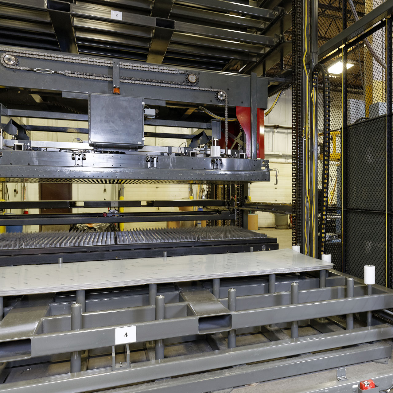 Automated Sheet Stacker for Laser Bed Tending | Progressive Surface