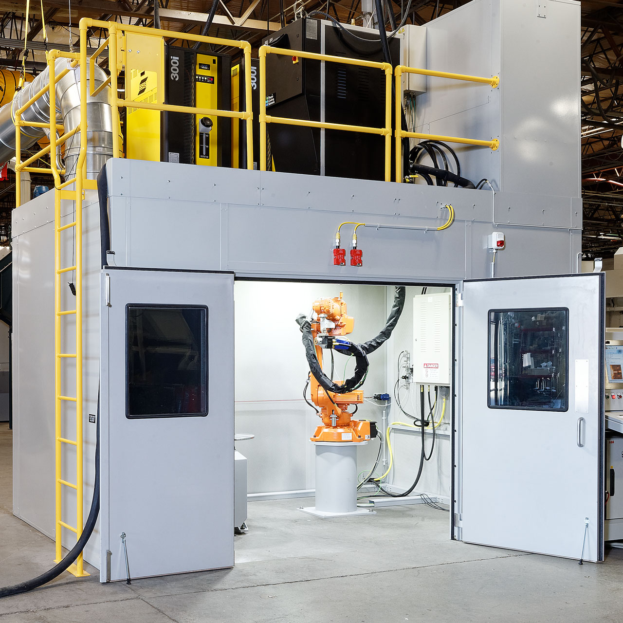 Robotic Plasma Spray Booth with Powder and Suspension Material Delivery | Progressive Surface