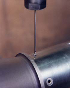 Figure 22 Peening a turbine shaft oil hole (0.140" diameter) | Progressive Surface